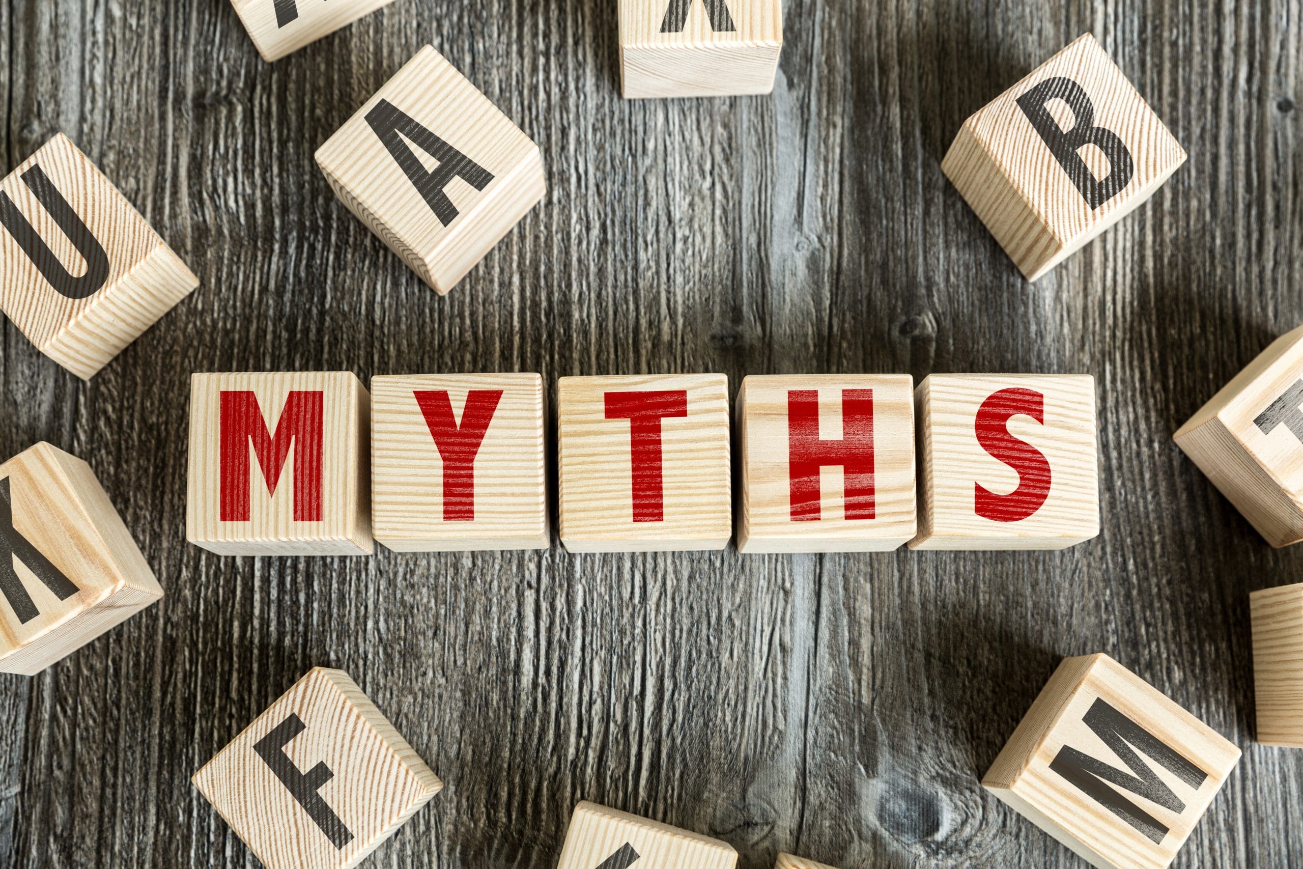 The word myths spelled out on wooden blocks.