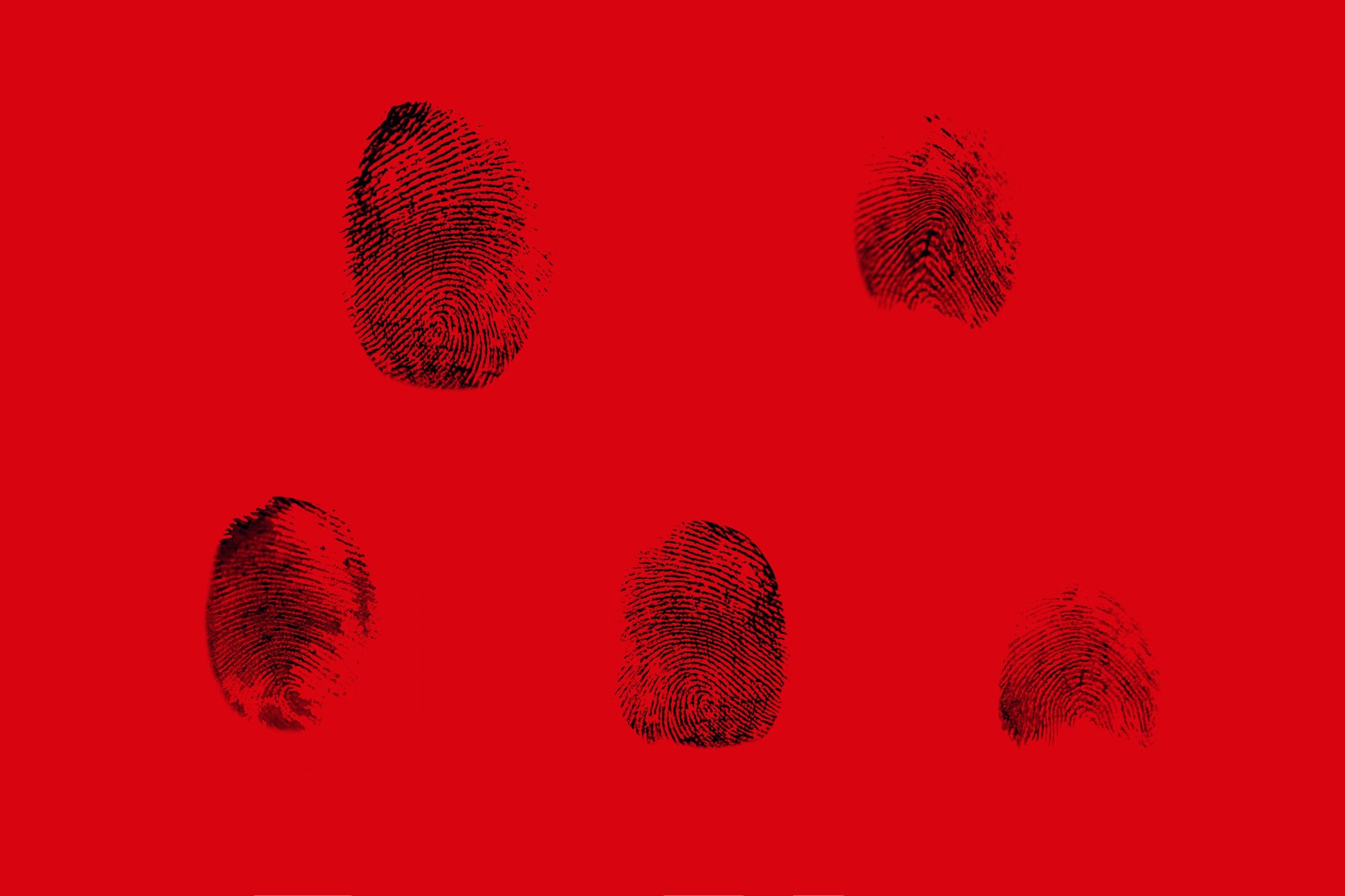 The cover of a book with four finger prints on a red background, symbolizing the need for expungement of DNA records.